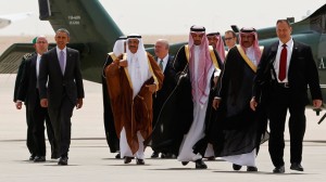 U.S. President Barack Obama (2nd L) is escorted from Marine One to board Air Force One as he departs Saudi Arabia to return to Washington, March 29.  /Reuters/Kevin Lamarque