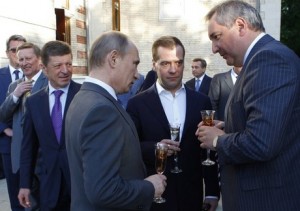 Dmitry Rogozin, right, with Vladimir Putin, center.  /AFP