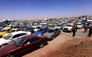 Out of Nineveh province: Iraqis at a Kurdish checkpoint 25 miles west of Arbil, on June 10.  /Safin Hamed/AFP/Getty Images