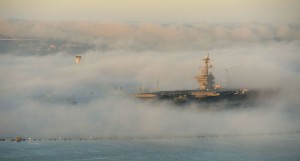 The aircraft carrier USS Carl Vinson (CVN 70) and naturally-occurring fog in San Diego on Feb. 11.  /DoD/Glenn Fawcett