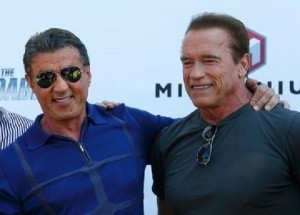 Sylvester Stallone and Arnold Schwarzenegger.  /Yves Herman/Reuters
