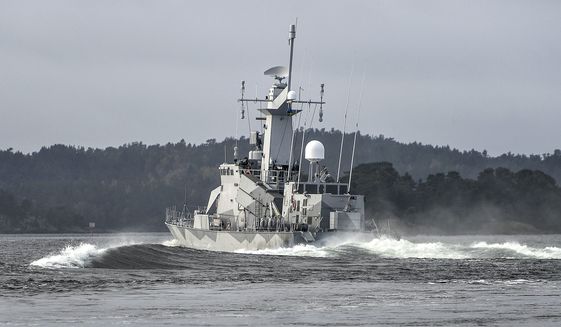 Tension shrouds NATO games as Sweden hunt Russian sub