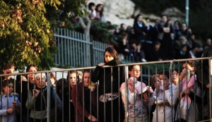 Israelis near funeral of Aryeh Kopinsky, Calman Levine and Avraham Shmuel Goldberg in Jerusalem, Nov. 18. / AFP