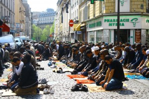 Muslims praying in the streets of France.