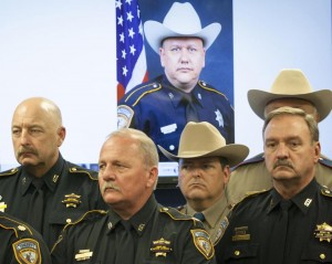 Law enforcement officers at a news conference about the Harris County shooting of Deputy Sheriff Darren Goforth.