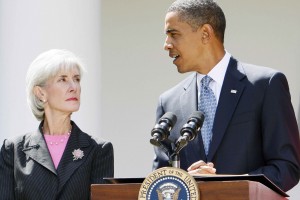 President Barack Obama stands with Health and Human Services Secretary Kathleen Sebelius as he makes a statement regarding the H1N1 swine flu virus in the Rose Garden of the White House in Washington, Tuesday, Sept. 1, 2009. (AP Photo/Charles Dharapak)