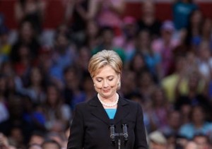 Sen. Hillary Rodham Clinton, D-N.Y., pauses as she is applauded at the National Building Museum in Washington, Saturday, June 7, 2008, where she suspended her campaign for president.      (AP Photo/Ron Edmonds)
