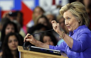 Democratic presidential candidate Hillary Rodham Clinton announces her college affordability plan, Monday, Aug. 10, 2015, at the High School in Exeter, N.H. (AP Photo/Jim Cole)