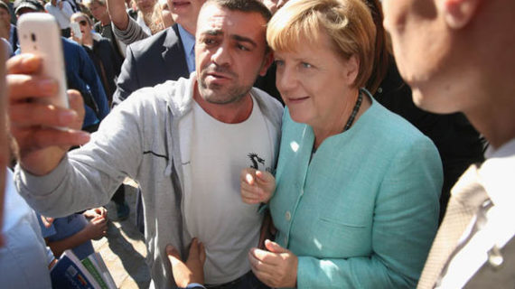 Merkel changes her tune, will pay migrants to leave Germany
