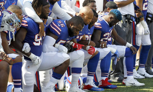 NFL and NBA have different rules for how high-paid athletes should respect national anthem