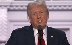 Trump speech hails power of real U.S. military, sounds alarm about nuclear subs near Cuba