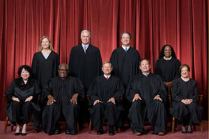 Roberts, Barrett join liberals as court rules against incoming president in lawfare case
