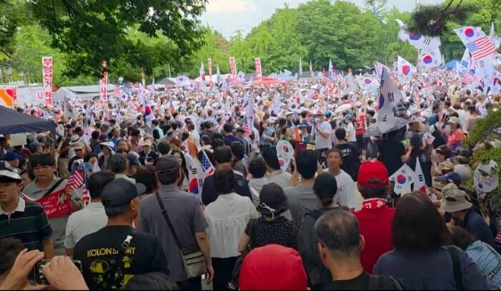 Photos of mass protests on national holiday tell the story unreported by South Korean media
